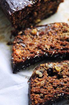 slices of chocolate banana bread with nuts on top