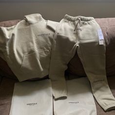 Brand New Kids Essential Sweatsuit Nike Sweats And Hoodie Set, Cheap Cotton Tracksuit For Streetwear, Nike Sweatsuits For Sale Handmade, Louis Vuitton Sweatshirt Replica, Luxury Sweatpants With Logo Detail For Streetwear, Nike Tech Fleece White Cream, Essentials Fear Of God Outfit, Pistachio Color, Essentials Fear Of God