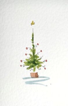 a watercolor painting of a small christmas tree