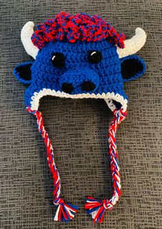 This Buffalo is ready for game day with it's red, white and blue. It's made with double yarn to keep you extra warm. Available in sizes: -1-3 years -Teen/Adult Perfect for twinning with your tiny Bills fan! Buffalo Bills Crochet, Buffalo Bills Hat, Stylish Winter Hats, Crochet Winter Hat, Crochet Winter Hats, Bills Football, Crochet Halloween, Yarn Craft, Crochet Winter