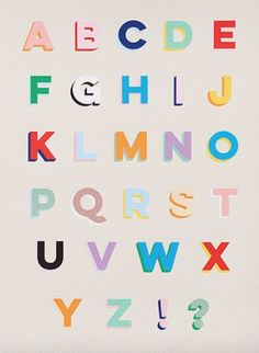 the letters are multicolored and have different shapes, sizes, and numbers on them