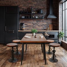 an industrial style kitchen with brick walls and wooden floors