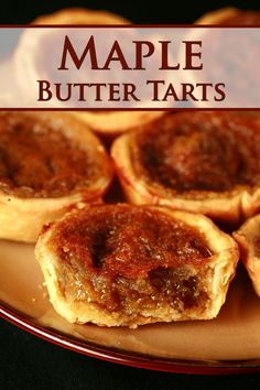 several small pies on a plate with the words maple butter tarts