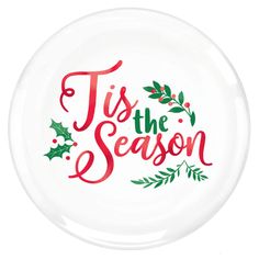 a glass plate with the words tis the season painted on it and holly leaves around it