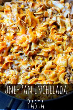 one - pan enchilada pasta with ground beef and cheese in a skillet