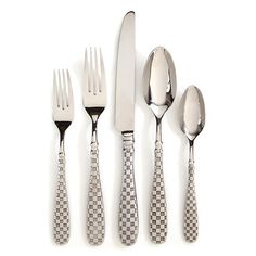 an assortment of silverware including forks, knives and spoons on a white background