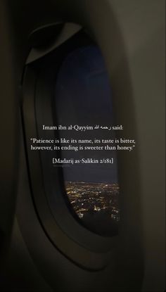 an airplane window with the view of city lights from it's seat and quote