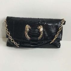 The Bag Is In Great Condition. The Leather Is In Great Condition . The Inside Is In Great Condition You Will Love This Beautiful Bag Black Python Leather Golden Hardware Made In Italy Serial Number /Date Code :La-G10-33206 Bulgari Clutch, Black Python, Number Date, Gold Bag, Bvlgari Bags, Beautiful Bags, Real Pictures, Python, In Italy