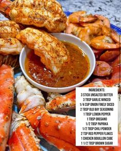 there are many different types of seafood on the plate, including crabs and lobsters