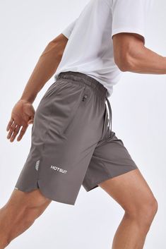 Our top rated Quick Dry Shorts are built for those who can’t sit still. This ultra breathable, lightweight and moisture wicking short will keep you going no matter what your day holds. Elastic waistband with drawstring for adjustable fit. Great for climbing, yoga and other outdoor activities, these durable shorts are designed for smooth, unrestricted movement. DETAILS + FABRIC TECH 80% Nylon 20% Spandex Breathable & Moisture-Wicking Moisture Absorption & Comfortable HOTSUIT Tech Fabric: SWEATNAV Active Wear Men, Men Athletic Outfits, Sportswear Details, Gym Shorts Men, Gym Wear Men, Sauna Suit, Athletic Clothes, Garment Details, Corporate Wear