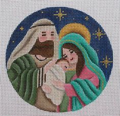 the birth of jesus is depicted in this cross - stitch pattern, which features an image of mary and joseph