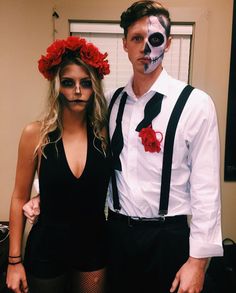 a man and woman are dressed up in costumes for halloween party, with makeup on their faces