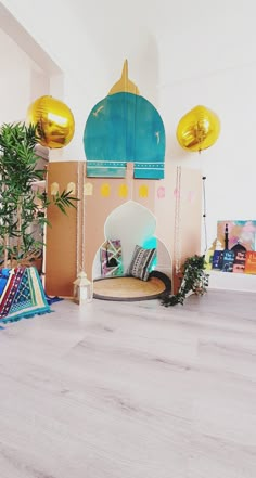 a living room filled with furniture and balloons