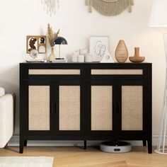 a black and beige sideboard in a living room