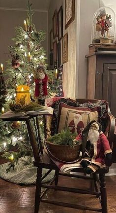 a living room with a small christmas tree in the corner