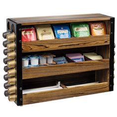 a wooden spice rack with six compartments filled with spices