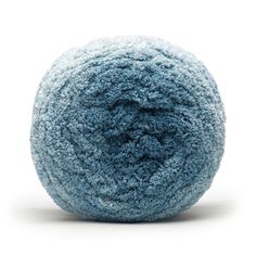 a blue ball of yarn on a white background