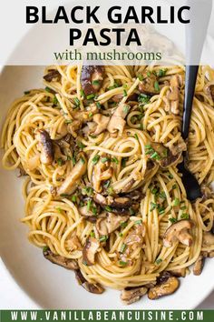 a white bowl filled with pasta and mushrooms