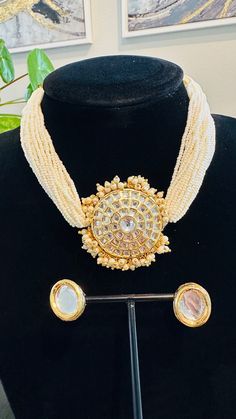 A Beautiful classic  combo of Kundan and pearls, this set can never go out of style. Neutral color so it can be paired with anything, for traditional or contemporary look, With tiny pearl strings it gives a very dainty look. Great for festivals or parties or weddings, can be worn just by itself or pair with long necklace for heavy look, goes perfectly with with saree and dresses.  Necklace comes in drawstring therefore adjustable, which makes it flexible and takes the shape of the neck for perfe Polki Necklace Choker, Pearl Strings, Polki Necklace, Necklace Indian, Indian Necklace, Necklace Pearl, Wedding Jewellery Necklace, Necklace Choker, Neutral Color