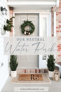 a front door with the words our neutral winter porch