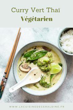 a bowl filled with broccoli and rice next to chopsticks on the side