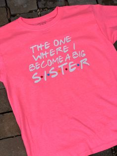 The one where I become a big sister is made on a youth unisex t-shirt ~ shown in safety pink ~ other colors available upon request ~  design is made using heat transfer vinyl ~ design is placed on the shirt using a commercial grade heat press ~  What a cool way to surprise big sister ~ have her open this super cool shirt or have her wear it over to the grandparents house ~  Thank you so much for shopping with me today! Please convo me with any questions or special requests I am happy to help 😊 Pink Pre-shrunk T-shirt For Gender Reveal, Personalized Pink T-shirt For Mother's Day, Pink T-shirt With Funny Print For Gender Reveal, Funny Text Pink T-shirt For Birthday, Personalized Family Matching Pink T-shirt, Funny Pink T-shirt For Gender Reveal, Personalized Pink T-shirt For Gender Reveal, Mother's Day Pink T-shirt With Funny Text, Personalized Pink Short Sleeve T-shirt