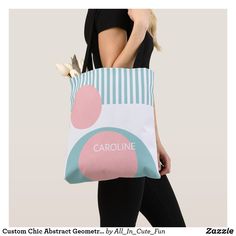 a woman is carrying a large bag with flowers in it and the name carolina on it