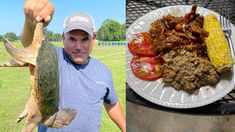 a man holding up a fish next to a plate of food