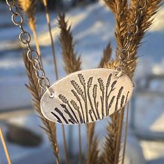 Ever imagine yourself running in a wheat feild at sunsent? This wheatgrass neckalace can allow to fantize throughout the day. Pheraps you love the rural areas and farm life and want to express that. This simple neckalace is perfect. We start with raw brass and use our unique, acid-free etching process to add the wheatgrass design. This necklace is available on an 18 inch cable chain, or a 30 inch monofilament cord. Both are completely adjustable. Beads may vary on cord necklaces. This style is o Cord Necklaces, Constellation Ring, Sterling Silver Cleaner, Mountain Jewelry, Jewelry Nature, Box Necklace, Wheat Grass, Necklace Box, Window Box