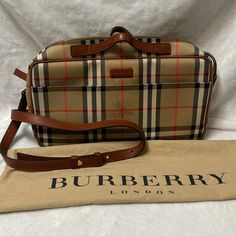 Nova Check Burberry London. Preloved With Dust Bag And Card Card In Very Good Condition. Size 13’, 6’, 3.5’ Burberry London, Card Card, Burberry Bag, Size 13, Burberry, Dust Bag, Bag Lady, London, Cream