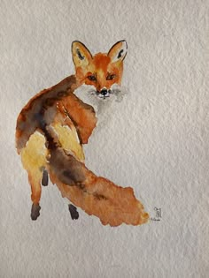 a watercolor painting of a fox on white paper