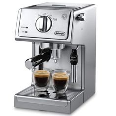 an espresso machine with two cups of coffee