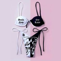 Brand New Boutique Item. Black & White Two Piece String Bikini Set. The Top Is White On The Right Side & Black On The Left One, With Contrasting Color Lettering On Each And The Bottoms Are Split Down The Center And Are Half White, Half Black. The Top Reads “Smile Now” “Cry Later” & Ties In The Center, Behind The Neck, & Behind The Back. The Bottoms Have A Graphic Of Half Of A Smiling Clown Face & Half A Crying One. Material Is Ribbed & Top Has Removable Padding. Fully Lined. See Pictures For Det White Letter Print Swimwear For Beach Season, White Letter Print Swimwear For The Beach, White Letter Print Swimwear For Beach, White Fitted Swimwear With Letter Print, Fitted White Swimwear With Letter Print, Black And White Two Piece, Unique Bikinis, 3d Skull, Perfect Swimsuit