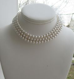 "Pearl Choker Necklace ~ This gorgeous 3 strand pearl necklace is made with Swarovski crystal pearls. It measures true choker length at 13\" to hug the neck, while the bottom 2 strands lay directly under it at a slightly longer length. It has a lobster claw closure and 2\" extender chain, which allows for perfect fit. Please note that when fully extended, the necklace will no longer 'graduate' but become clustered. The extender chain is just to allow for a little breathing room in the choker! Th 3 Strand Pearl Choker, Choker Pearl Necklace, Bridal Jewelry Pearl, Mother Of The Bride Jewelry, Three Strand Pearl Necklace, Pearl Necklace Bridal, Choker Pearl, Black Vampire, Womens Gifts