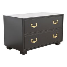 a black and gold dresser with two drawers