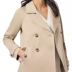 Chic And Sophisticated, This Jones New York Signature Trench Coat Is A Wardrobe Must-Have! Color: Praline (Beautiful Tan Shade) Style: Double-Breasted Trench Coat Length: Falls Just Below The Waist, Perfect For A Flattering Silhouette Details: Button Closures At Front (Double-Breasted) Buttoned Pockets For A Polished Look Button Details On Sleeves For Added Style This Timeless Trench Coat Is Perfect For Layering Over Dresses, Skirts, Or Jeans. The Praline Color Is A Versatile Neutral That Will C Winter Gabardine Blazer, Tailored Gabardine Outerwear For Spring, Career Outerwear With Lapel Collar For Spring, Gabardine Outerwear For Fall, Spring Career Outerwear With Lapel Collar, Elegant Khaki Outerwear For Business Casual, Elegant Khaki Business Casual Outerwear, Tailored Outerwear With Hidden Button Closure, Chic Solid Outerwear For Career