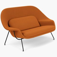 an orange couch with black legs on a white background