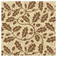 an area rug with leaves and acorns in brown, beige and cream colors