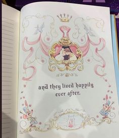 an open book with the words happily ever after written in purple and gold on it