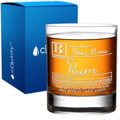 an empty glass next to a blue box with the label for your name run on it