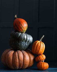 a stack of pumpkins sitting on top of each other