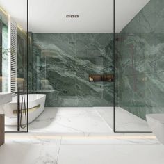 a modern bathroom with marble walls and floor