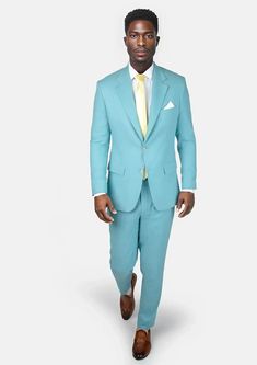 The vibrant linen cotton blend of the Astor Capri Blue Linen Suit will have you embracing the summer heat in comfort and confidence. Custom made and a guaranteed way to upgrading your wardrobe with a stylish, statement piece. Fitted Linen Summer Suits, Summer Fitted Linen Suit, Tailored Casual Summer Suits, Tailored Casual Summer Sets, Fitted Linen Summer Sets, Fitted Linen Sets For Summer, Tailored Blue Cotton Suit, Blue Linen Suits For Business Casual, Tailored Blue Summer Suits