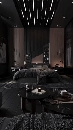 a bedroom with black furniture and lights on the ceiling is pictured in this image, it appears to be very dark