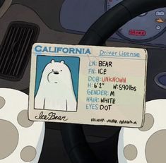 a sign that is on the steering wheel of a car with an image of a polar bear