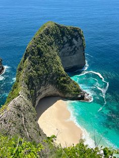 an aerial view of the beach and cliffs in nusa penida national park, indonesia