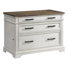 a white dresser with two drawers and wood top