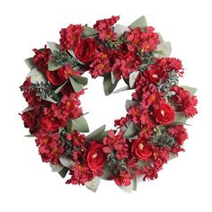 a wreath with red flowers and greenery