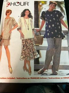 two women's tops and pants are shown in this sewing pattern, but no one is wearing them