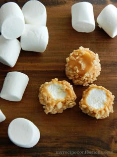 marshmallows and sugar on a wooden table